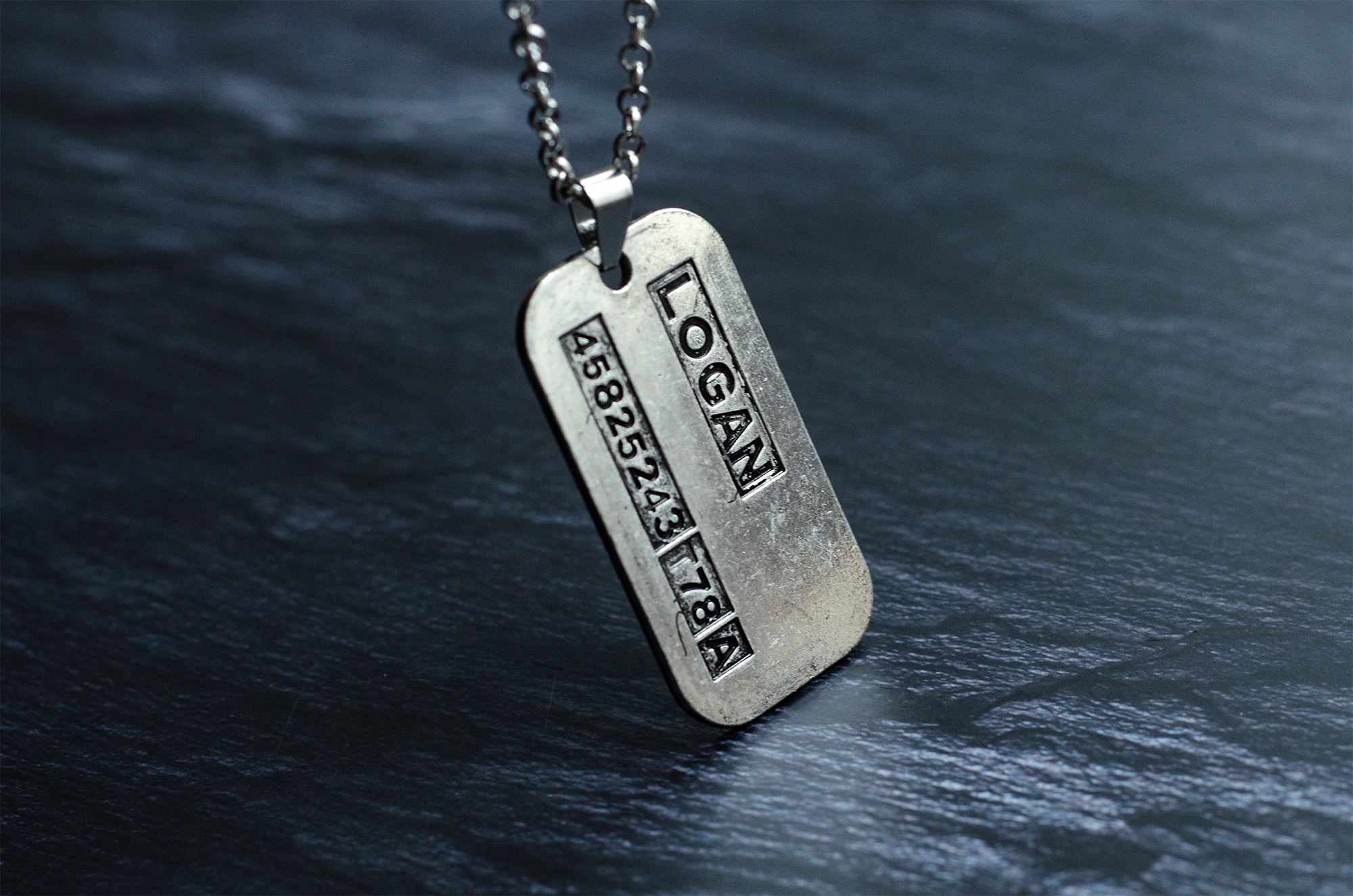 Кулон Логан