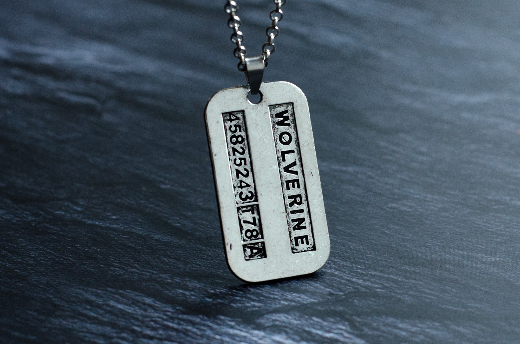 Кулон Логан