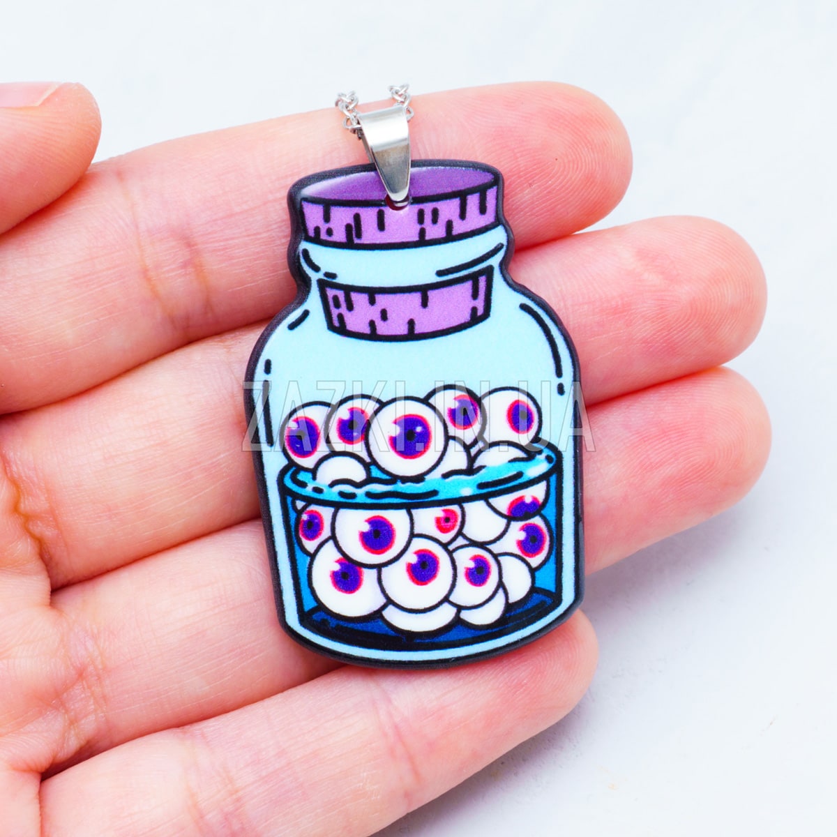 Кулон Банка з очними яблуками