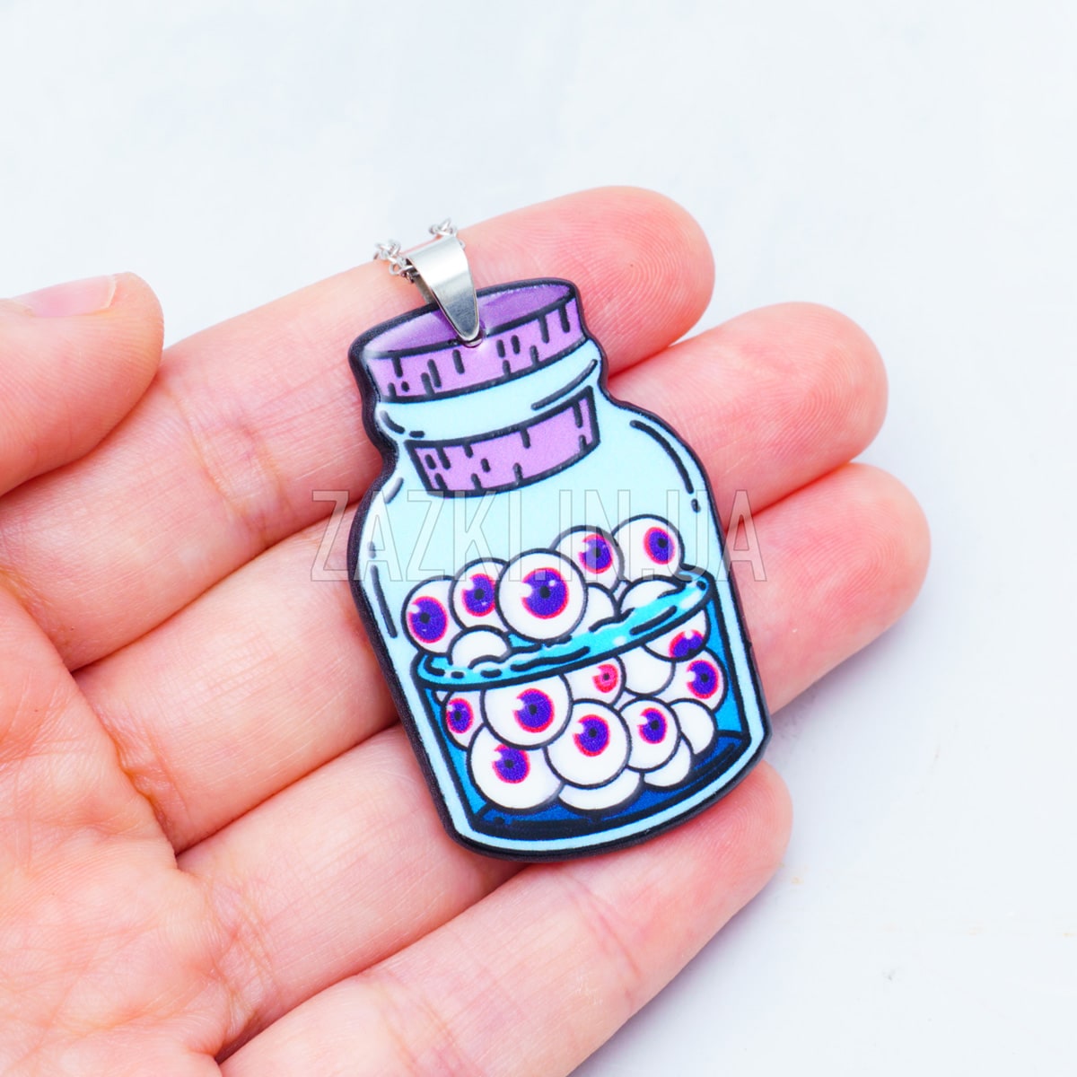 Кулон Банка з очними яблуками